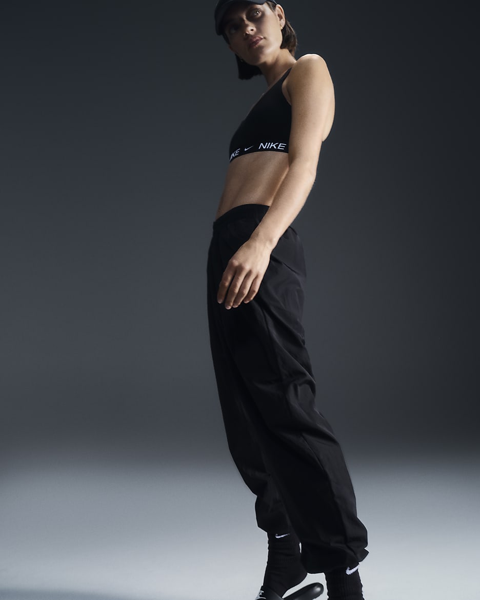 Nike Sportswear Essential geweven oversized joggingbroek met halfhoge taille voor dames. Nike NL